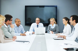 A large cheerful group of successful businesspeople on a meeting in the office. [url=https://www.istockphoto.com/search/lightbox/9786622][img]https://dl.dropbox.com/u/40117171/business.jpg[/img][/url]